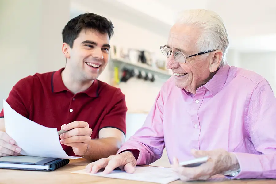 Power of Attorney - father and son go over paperwork to establish son's position as POA for his elderly father - Jacksonville, IL